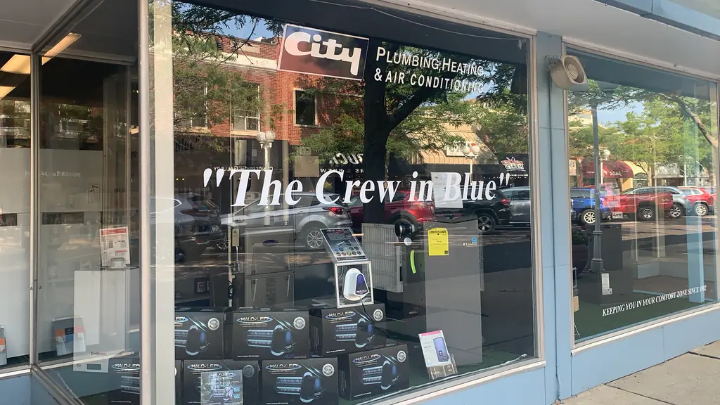 The State Street storefront window showing REME HALO air purification units on display.